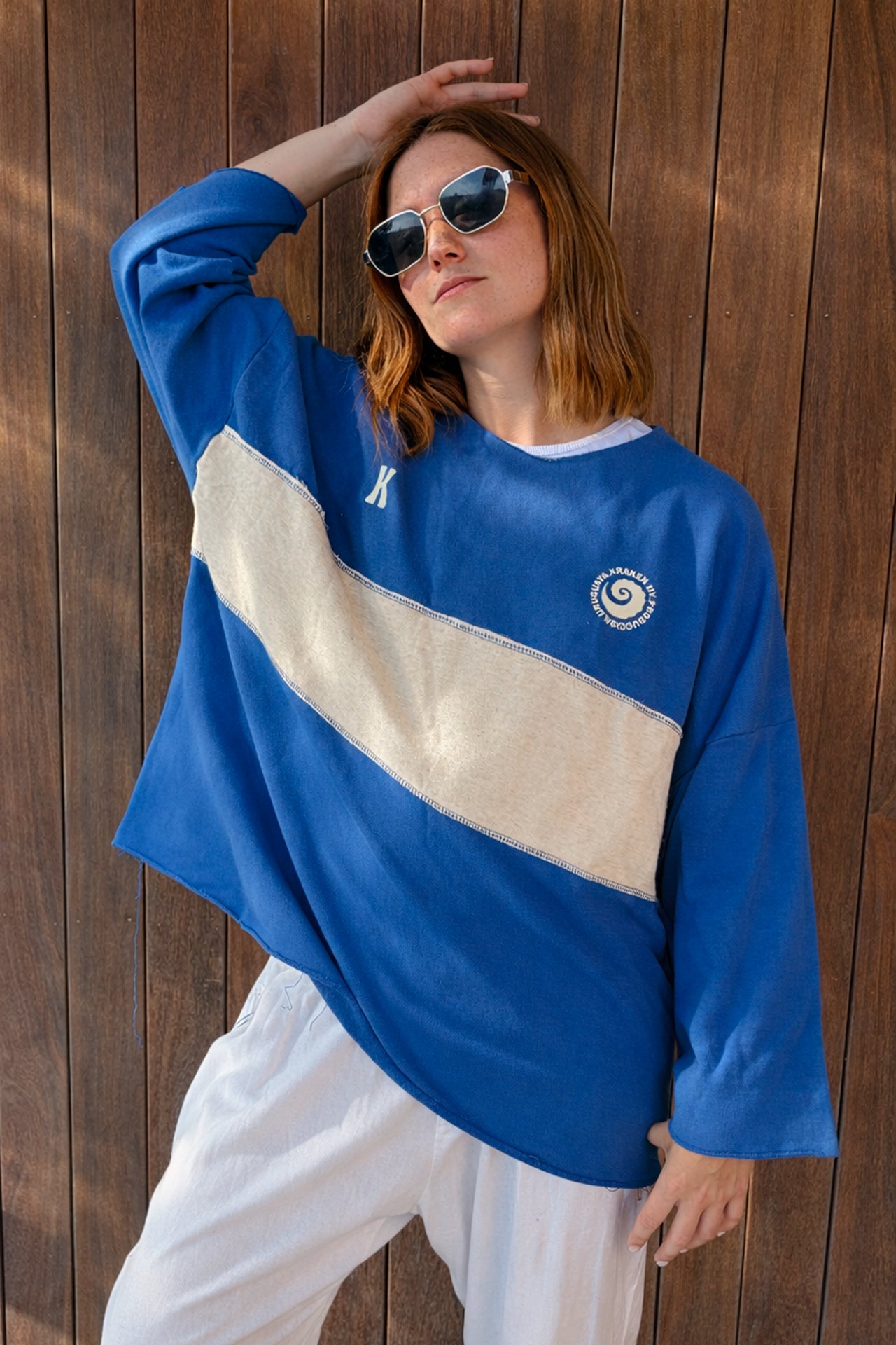 Poncho manga 3/4 azul y crudo