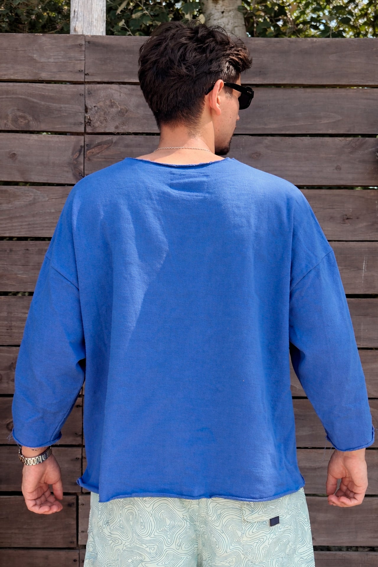 Poncho manga 3/4 azul y crudo